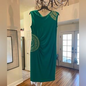 Beautiful size 8 green form fitting dress with gold detailing